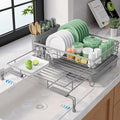 Kitsure Extendable Dish Drying Rack - Rust-Resistant Dish Racks for Kitchen Counter with Adjustable Support Legs, Cutlery Holder & Removable Draining Tray (Grey, 15.6''-25.2''L × 16.9''W × 8.1''H)